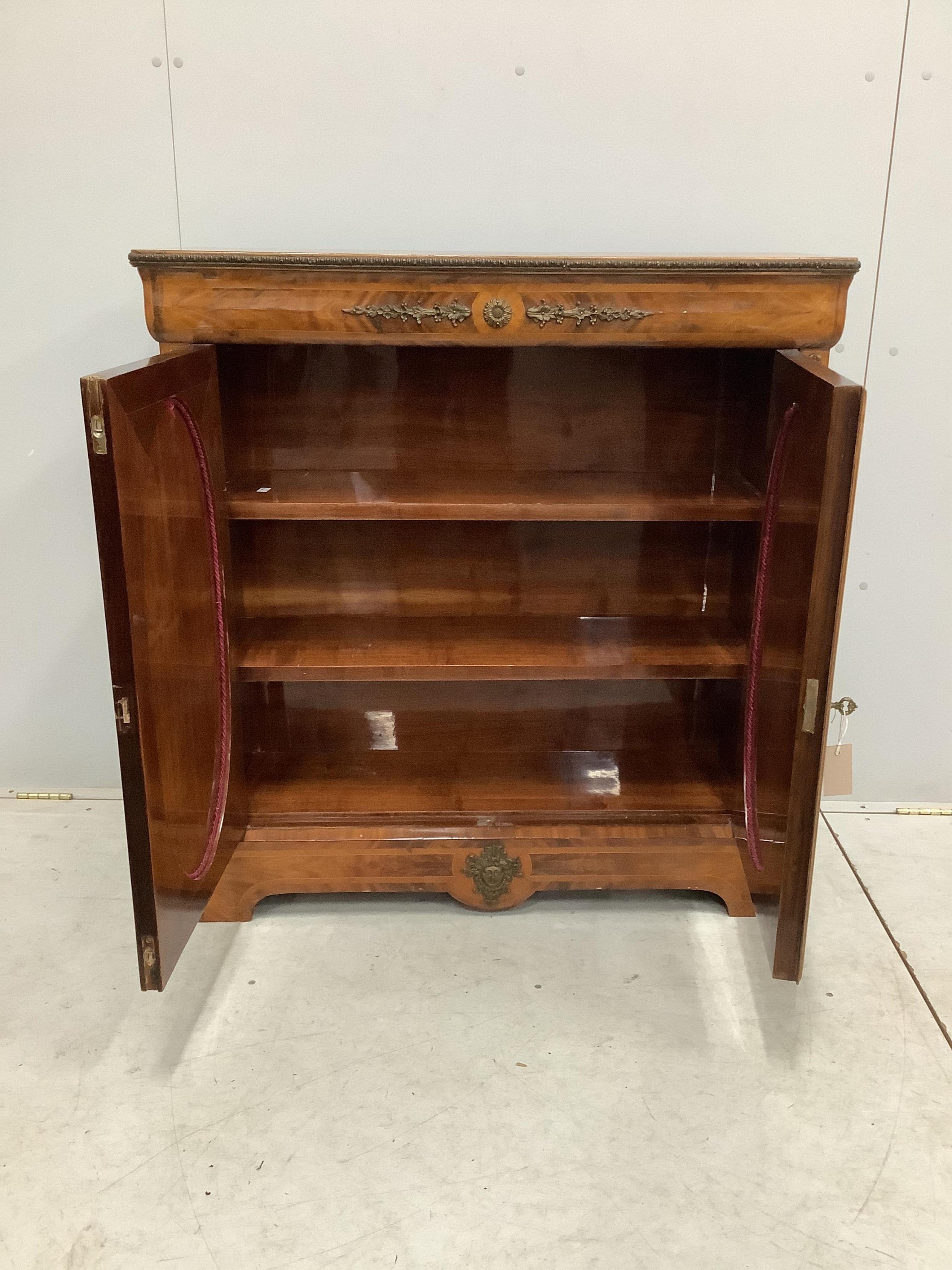 A gilt metal mounted cross banded and marquetry inlaid side cabinet, width 101cm, depth 31cm, height 105cm. Condition - fair